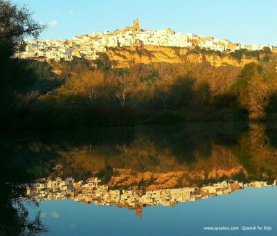 Arcos de la Frontera. The town reflected in a lake.