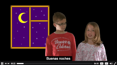 Closed caption 'Buenas noches' on a video still